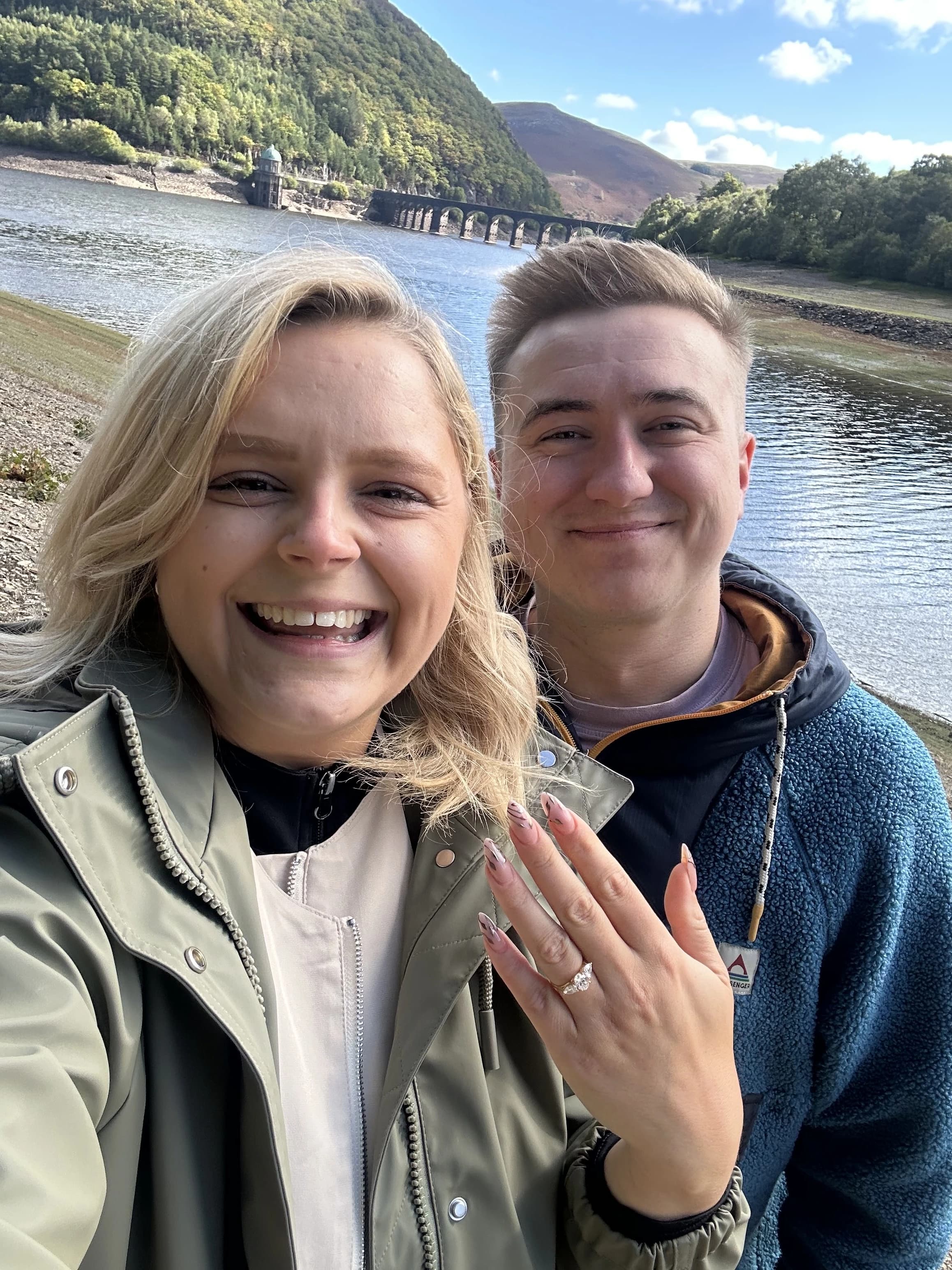 Rob & Beth showing off their new engagement ring